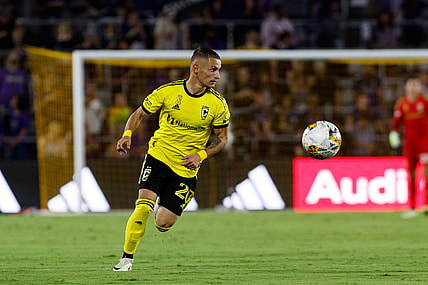 Sep 16, 2023; Orlando, Florida, USA; Columbus Crew midfielder Alexandru Matan (20) chases the ball against Orlando City SC in the second half at Exploria Stadium. Mandatory Credit: Morgan Tencza-USA TODAY Sports