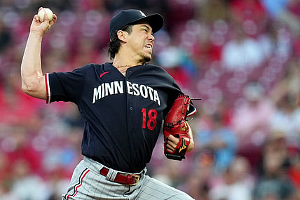 Minnesota Twins starting pitcher Kenta Maeda (18) delivers a pitch in the second inning of a baseball game against the Minnesota Twins, Tuesday, Sept. 19, 2023, at Great American Ball Park in Cincinnati.