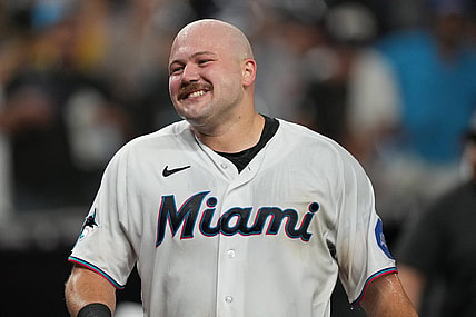 Sep 19, 2023; Miami, Florida, USA;  Miami Marlins third baseman Jake Burger (36) gets dunked by teammates after hitting the game winning RBI single in the ninth inning against the New York Mets at loanDepot Park. Mandatory Credit: Jim Rassol-USA TODAY Sports