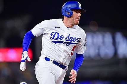 Sep 19, 2023; Los Angeles, California, USA; Los Angeles Dodgers first baseman Freddie Freeman (5) advances to third against the Detroit Tigers during the first inning at Dodger Stadium. Mandatory Credit: Gary A. Vasquez-USA TODAY Sports