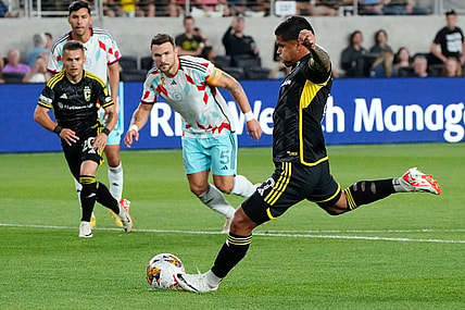 Sep 20, 2023; Columbus, Ohio, USA; Columbus Crew forward Cucho Hernandez (9) fires a shot past Chicago Fire defender Rafael Czichos (5) during the first half of the MLS soccer game at Lower.com Field.