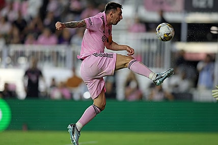 Sep 20, 2023; Fort Lauderdale, Florida, USA; Inter Miami forward Lionel Messi (10) kicks the ball against the Toronto FC during the first half at DRV PNK Stadium. Mandatory Credit: Sam Navarro-USA TODAY Sports