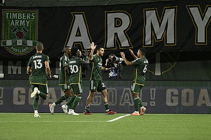 Sep 20, 2023; Portland, Oregon, USA;  Portland Timbers midfielder Cristhian Paredes (22) celebrates with teammates after scoring against San Jose Earthquakes during the first half at Providence Park. Mandatory Credit: Troy Wayrynen-USA TODAY Sports