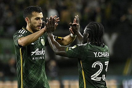 Sep 20, 2023; Portland, Oregon, USA; Portland Timbers midfielder Cristhian Paredes (22) celebrates with defender Oskar Agren (23) after the win against the San Jose Earthquakes at Providence Park. Mandatory Credit: Troy Wayrynen-USA TODAY Sports