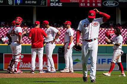 Cincinnati Reds relief pitcher Alexis Diaz (43) is pulled from the mound by manager David Bell (25) in the ninth inning of the MLB Interleague game between the Cincinnati Reds and the Minnesota Twins at Great American Ball Park in downtown Cincinnati on Wednesday, Sept. 20, 2023.