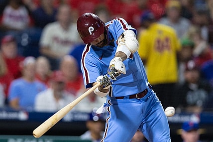 Sep 21, 2023; Philadelphia, Pennsylvania, USA; Philadelphia Phillies right fielder Nick Castellanos (8) hits a two RBI single during the first inning against the New York Mets at Citizens Bank Park. Mandatory Credit: Bill Streicher-USA TODAY Sports
