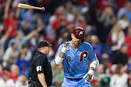 Sep 21, 2023; Philadelphia, Pennsylvania, USA; Philadelphia Phillies right fielder Nick Castellanos (8) tosses his bat after hitting a home run during the sixth inning against the New York Mets at Citizens Bank Park. Mandatory Credit: Bill Streicher-USA TODAY Sports