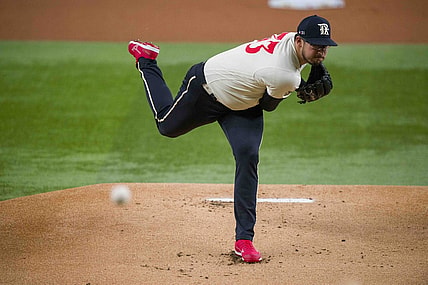 Sep 22, 2023; Arlington, Texas, USA; Texas Rangers starting pitcher Dane Dunning (33) pitches against the Seattle Mariners during the first inning at Globe Life Field. Mandatory Credit: Jerome Miron-USA TODAY Sports