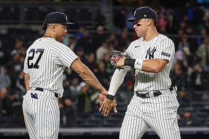Sep 22, 2023; Bronx, New York, USA; New York Yankees right fielder Aaron Judge (99) celebrates with designated hitter Giancarlo Stanton (27) after defeating the Arizona Diamondbacks at Yankee Stadium. Mandatory Credit: Vincent Carchietta-USA TODAY Sports