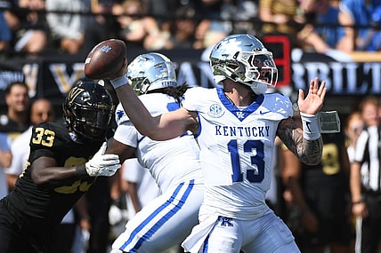 Sep 23, 2023; Nashville, Tennessee, USA; Kentucky Wildcats quarterback Devin Leary (13) throws a pass against the Vanderbilt Commodores during the first half at FirstBank Stadium. Mandatory Credit: Christopher Hanewinckel-USA TODAY Sports