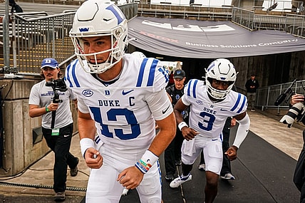 Sep 23, 2023; East Hartford, Connecticut, USA; Duke Blue Devils quarterback Riley Leonard (13) heads onto the field to warm up before the start of the game against the UConn Huskies at Rentschler Field at Pratt & Whitney Stadium. Mandatory Credit: David Butler II-USA TODAY Sports