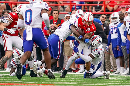 Sep 23, 2023; Lincoln, Nebraska, USA; Nebraska Cornhuskers wide receiver Billy Kemp IV (1) runs against Louisiana Tech Bulldogs defensive back Cecil Singleton Jr. (2) and defensive back Willie Roberts (1) during the first quarter at Memorial Stadium. Mandatory Credit: Dylan Widger-USA TODAY Sports