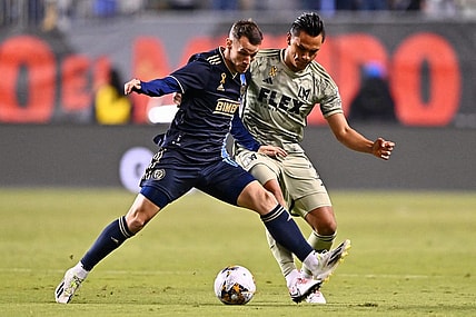 Sep 23, 2023; Philadelphia, Pennsylvania, USA; Philadelphia Union midfielder Deniel Gazdag (10) battles for the ball against Los Angeles FC defender Denil Maldonado (2) during the first half at Subaru Park. Mandatory Credit: Kyle Ross-USA TODAY Sports