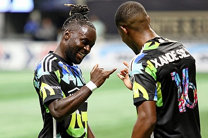 Sep 23, 2023; Atlanta, Georgia, USA; Atlanta United forward Xande Silva (right) celebrates after scoring a goal against CF Montreal with midfielder Tristan Muyumba (8) during the first half at Mercedes-Benz Stadium. Mandatory Credit: Jordan Godfree-USA TODAY Sports