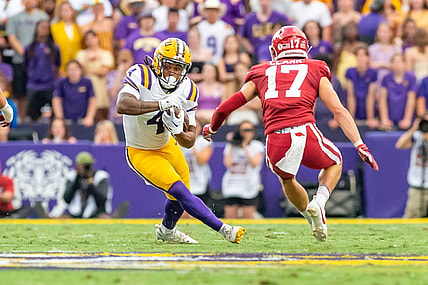 Runningback John Emery Jr 4 runs the ball as the LSU Tigers take on the Arkansas Razorbacks at Tiger Stadium in Baton Rouge, Louisiana, Sept. 23, 2023.