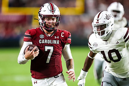 Sep 23, 2023; Columbia, South Carolina, USA; South Carolina Gamecocks quarterback Spencer Rattler (7) scrambles against the Mississippi State Bulldogs in the second half at Williams-Brice Stadium. Mandatory Credit: Jeff Blake-USA TODAY Sports