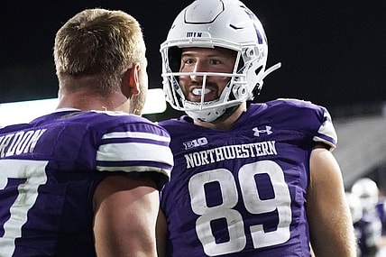 Sep 23, 2023; Evanston, Illinois, USA; Northwestern Wildcats tight end Charlie Mangieri (89) celebrates his game winning touchdown in overtime against the Minnesota Golden Gophers during the second half at Ryan Field. Mandatory Credit: David Banks-USA TODAY Sports