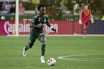 Sep 23, 2023; Portland, Oregon, USA; Portland Timbers midfielder Santiago Moreno (30) controls the ball during the second half against the Colorado Rapids at Providence Park. Mandatory Credit: Troy Wayrynen-USA TODAY Sports
