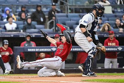 Sep 24, 2023; Bronx, New York, USA; Arizona Diamondbacks left fielder Corbin Carroll (7) scores on a sacrifice fly by first baseman Christian Walker (not pictured) during the first inning against the New York Yankees at Yankee Stadium. Mandatory Credit: John Jones-USA TODAY Sports
