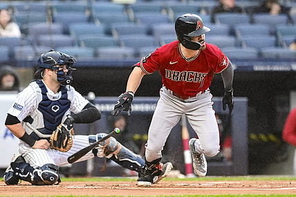 Sep 24, 2023; Bronx, New York, USA; Arizona Diamondbacks left fielder Corbin Carroll (7) hits a double against the New York Yankees during the first inning at Yankee Stadium. Mandatory Credit: John Jones-USA TODAY Sports