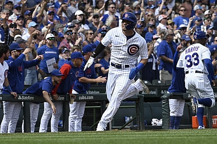 Sep 24, 2023; Chicago, Illinois, USA;  Chicago Cubs right fielder Seiya Suzuki (27) heads to home plate to score against the Colorado Rockies during the second inning at Wrigley Field. Mandatory Credit: Matt Marton-USA TODAY Sports
