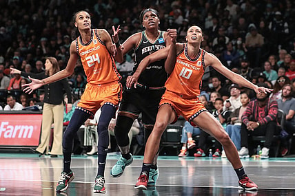 Sep 24, 2023; Brooklyn, New York, USA; New York Liberty forward Jonquel Jones (35) boxes out for a rebound on Connecticut Sun forwards DeWanna Bonner (24) and Olivia Nelson-Ododa (10) in the third quarter during game one of the 2023 WNBA Playoffs at Barclays Center. Mandatory Credit: Wendell Cruz-USA TODAY Sports