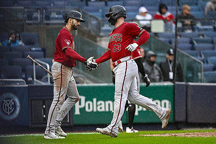 Sep 24, 2023; Bronx, New York, USA; Arizona Diamondbacks first baseman Christian Walker (53) is greeted by Arizona Diamondbacks shortstop Jordan Lawlar (10) after scoring on a two RBI single by Arizona Diamondbacks third baseman Evan Longoria (not pictured) during the seventh inning against the New York Yankees at Yankee Stadium. Mandatory Credit: John Jones-USA TODAY Sports