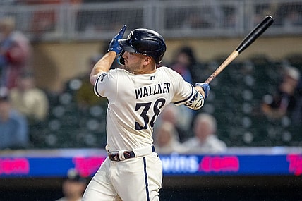 Sep 26, 2023; Minneapolis, Minnesota, USA; Minnesota Twins left fielder Matt Wallner (38) hits a grand slam against the Oakland Athletics in the first inning at Target Field. Mandatory Credit: Jesse Johnson-USA TODAY Sports