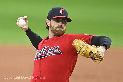 Sep 27, 2023; Cleveland, Ohio, USA; Cleveland Guardians starting pitcher Shane Bieber (57) delivers a pitch in the first inning against the Cincinnati Reds at Progressive Field. Mandatory Credit: David Richard-USA TODAY Sports