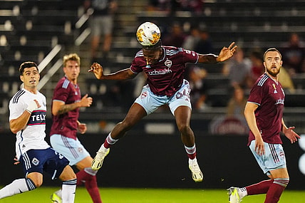 Sep 27, 2023; Commerce City, Colorado, USA; Colorado Rapids defender Moise Bombiio (64) heads the ball in the first half against the Vancouver Whitecaps FC at Dick's Sporting Goods Park. Mandatory Credit: Ron Chenoy-USA TODAY Sports