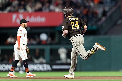 Sep 27, 2023; San Francisco, California, USA; San Diego Padres first baseman Garrett Cooper (24) runs the bases after hitting a solo home run against the San Francisco Giants during the seventh inning at Oracle Park. Mandatory Credit: John Hefti-USA TODAY Sports