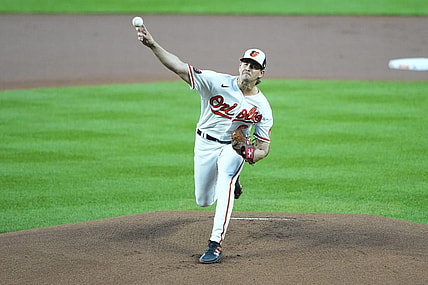 Sep 28, 2023; Baltimore, Maryland, USA; Baltimore Orioles pitcher Dean Kremer (64) delivers a pitch against the Boston Red Sox during the first inning at Oriole Park at Camden Yards. Mandatory Credit: Gregory Fisher-USA TODAY Sports