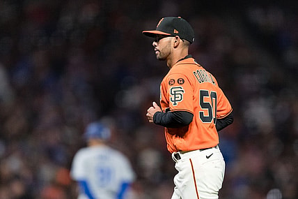 Sep 29, 2023; San Francisco, California, USA;  San Francisco Giants interim manager Kai Correa (50) returns to the dugout after lifting starting pitcher Keaton Winn (67)  during the sixth inning of the game against the Los Angeles Dodgers at Oracle Park. Mandatory Credit: John Hefti-USA TODAY Sports