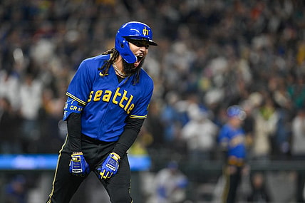 Sep 29, 2023; Seattle, Washington, USA; Seattle Mariners shortstop J.P. Crawford (3) celebrates after hitting a grand slam against the Texas Rangers during the fourth inning at T-Mobile Park. Mandatory Credit: Steven Bisig-USA TODAY Sports