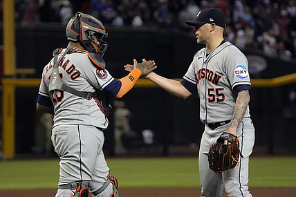 Sep 29, 2023; Phoenix, Arizona, USA; Houston Astros catcher Martin Maldonado (15) and pitcher Ryan Pressly (55) celebrates after defeating the Arizona Diamondbacks at Chase Field. Mandatory Credit: Rick Scuteri-USA TODAY Sports