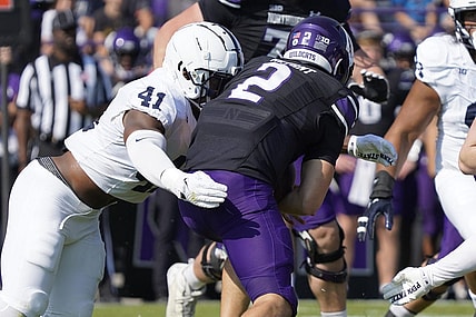 Sep 30, 2023; Evanston, Illinois, USA; Penn State Nittany Lions linebacker Kobe King (41) sacks Northwestern Wildcats quarterback Ben Bryant (2) during the first half at Ryan Field. Mandatory Credit: David Banks-USA TODAY Sports