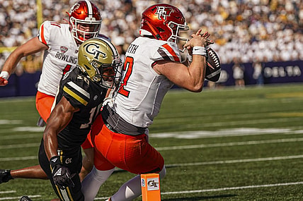 Sep 30, 2023; Atlanta, Georgia, USA; Bowling Green Falcons quarterback Camden Orth (12) tries to score at the pylon past Georgia Tech Yellow Jackets defensive back Kenan Johnson (10) during the first half at Hyundai Field. Mandatory Credit: Dale Zanine-USA TODAY Sports