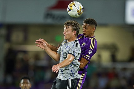 Sep 30, 2023; Orlando, Florida, USA;  Orlando City SC defender Rafael Santos (3) and CF Montreal midfielder Bryce Duke (10) battle for a head ball in the first half at Exploria Stadium. Mandatory Credit: Nathan Ray Seebeck-USA TODAY Sports
