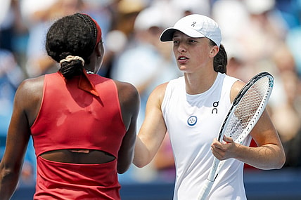 Aug 19, 2023; Mason, OH, USA; Iga Swiatek (POL) shakes hands with Coco Gauff (USA) after the match during the Western and Southern Open tennis tournament at Lindner Family Tennis Center. Mandatory Credit: Katie Stratman-USA TODAY Sports