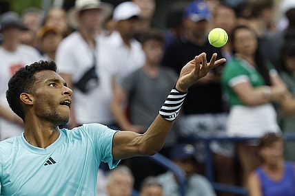 Aug 28, 2023; Flushing, NY, USA; Felix Auger-Aliassime of Canada serves against Mackenzie McDonald of the United States (not pictured) on day one of the 2023 US Open at the Billie Jean King National Tennis Center. Mandatory Credit: Geoff Burke-USA TODAY Sports