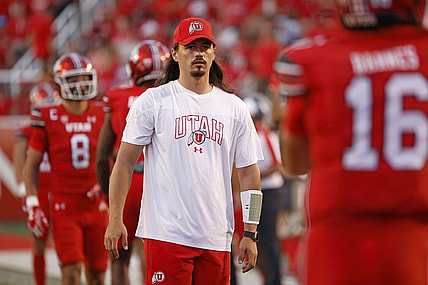 Aug 31, 2023; Salt Lake City, Utah, USA; Utah Utes quarterback Cameron Rising (7), out with an injury warms his quarterback up at halftime against the Florida Gators at Rice-Eccles Stadium. Mandatory Credit: Jeff Swinger-USA TODAY Sports