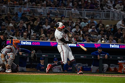 Sep 8, 2023; Minneapolis, Minnesota, USA; Minnesota Twins shortstop Carlos Correa (4) hits a solo home run during the fourth inning against the New York Mets at Target Field. Mandatory Credit: Jordan Johnson-USA TODAY Sports