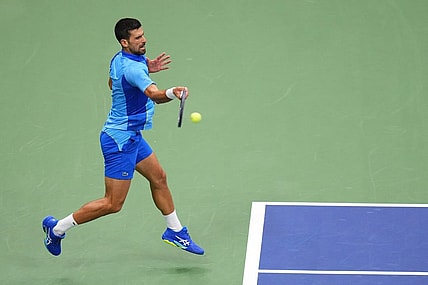 Sep 10, 2023; Flushing, NY, USA; Novak Djokovic of Serbia hits a forehand against Daniil Medvedev (not pictured) in the men's singles final in the men's singles final on day fourteen of the 2023 U.S. Open tennis tournament at USTA Billie Jean King National Tennis Center. Mandatory Credit: Danielle Parhizkaran-USA TODAY Sports