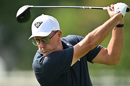 Sep 22, 2023; Sugar Grove, Illinois, USA; Phil Mickelson hits balls on the range during the first round of the LIV Golf Chicago golf tournament at Rich Harvest Farms. Mandatory Credit: Jamie Sabau-USA TODAY Sports