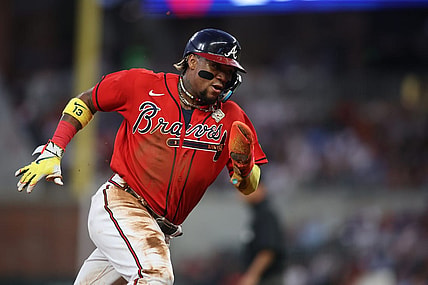 Sep 29, 2023; Atlanta, Georgia, USA; Atlanta Braves right fielder Ronald Acuna Jr. (13) rounds third against the Washington Nationals in the first inning at Truist Park. Mandatory Credit: Brett Davis-USA TODAY Sports