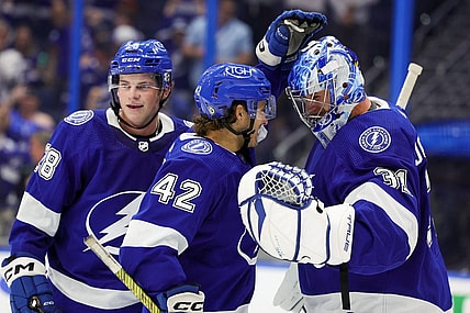 Sep 29, 2023; Tampa, Florida, USA;  Tampa Bay Lightning goaltender Jonas Johansson (31) is congratulated by Tampa Bay Lightning center Felix Robert (42) and defenseman Jack Thompson (28) after beating the Carolina Hurricanes during preseason at Amalie Arena. Mandatory Credit: Nathan Ray Seebeck-USA TODAY Sports