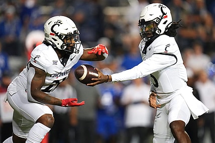 Cincinnati Bearcats quarterback Emory Jones (5) Cincinnati Bearcats running back Corey Kiner (21) in the first quarter during a college football game between the Brigham Young Cougars and the Cincinnati Bearcats, Friday, Sept. 29, 2023, at LaVell Edwards Stadium in Provo, Utah.