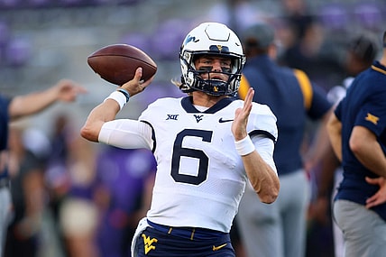 Sep 30, 2023; Fort Worth, Texas, USA; West Virginia Mountaineers quarterback Garrett Greene (6) throws a pass before the game against the TCU Horned Frogs at Amon G. Carter Stadium. Mandatory Credit: Tim Heitman-USA TODAY Sports