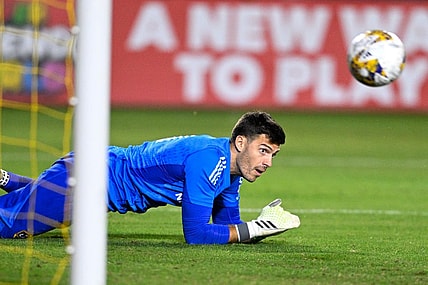 Sep 30, 2023; Carson, California, USA; LA Galaxy goalkeeper Jonathan Bond (1) watches as Portland Timbers forward Santiago Moreno (30) scores a goal during the first half at Dignity Health Sports Park. Mandatory Credit: Kelvin Kuo-USA TODAY Sports