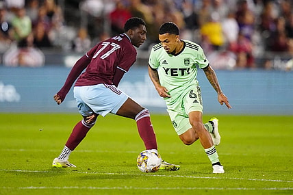 Sep 30, 2023; Commerce City, Colorado, USA; Austin FC midfielder Daniel Pereira (6) steals the ball away from Colorado Rapids forward Darren Yapi (77) in the second half at Dick's Sporting Goods Park. Mandatory Credit: Ron Chenoy-USA TODAY Sports